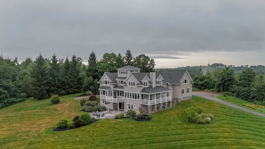 Aerial view of a large home and landscaped grounds