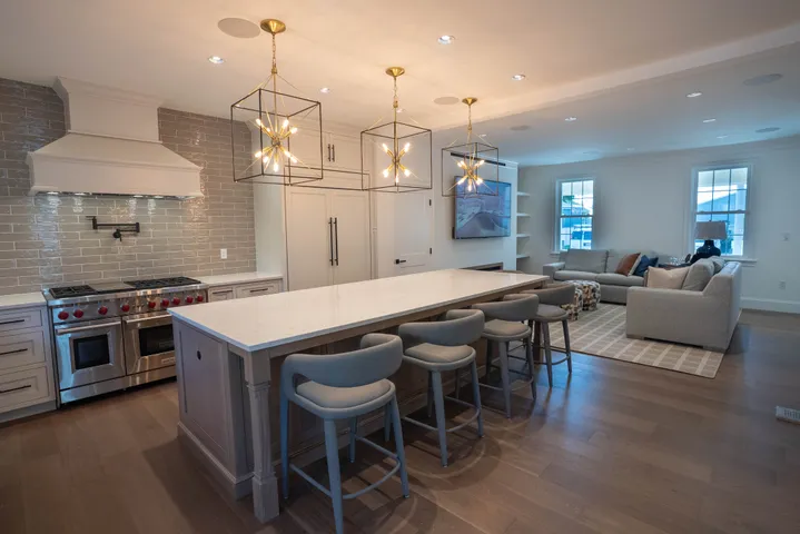 Bright kitchen with a central island and pendant lighting