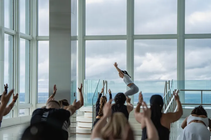 Group stretching in a bright fitness studio