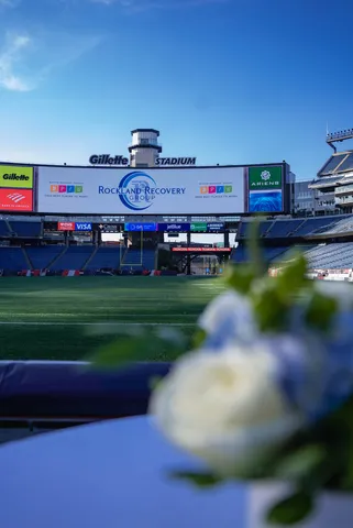 Stadium seating and video board viewed from the field